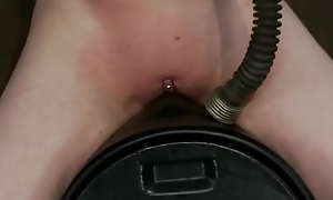 Slave mounted on sybian in the air