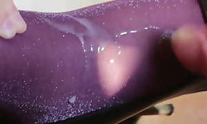 Nylon cumshot on lurex purple pantyhose feet