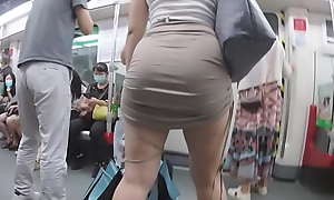 Nice asian teen's ass in skirt