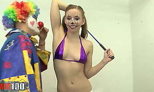 Skinny young blonde babe Norah Nova fucked by a clown