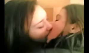 Lesbian Friends Kissing In Hallway -