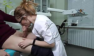 A female ukrainian doctor with glasses grabbed the patient's cock and began to greedily give him a hardcore blowjob