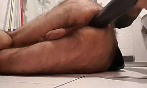 Elbow formerly larboard by black rubber hand fake penis