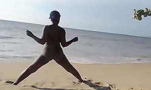 Ebony woman doing some fray naked on the coast