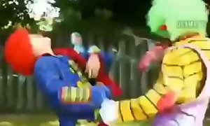 Clown fighting while engulfing clown dick