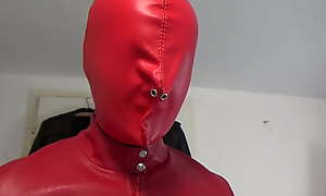 Red leather hooded wife in cohere and chains