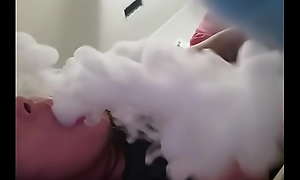 Girl blow clouds