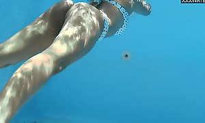 Irina Hutch confine busty undersea babe