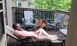 Jerking off naked on my balcony all round the rain!!