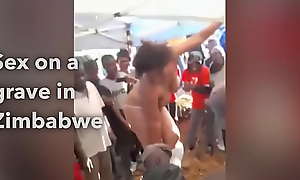 Zimbabwe woman fucks on top of grave