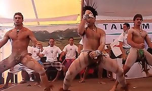 Nearly naked warrior dance