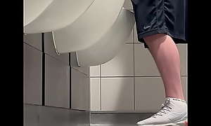 Piss at urinal manchester