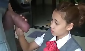 Oriental schoolgirl opens yon with reference to suck giving cock