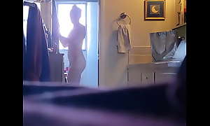 Hot teen caught getting out the shower